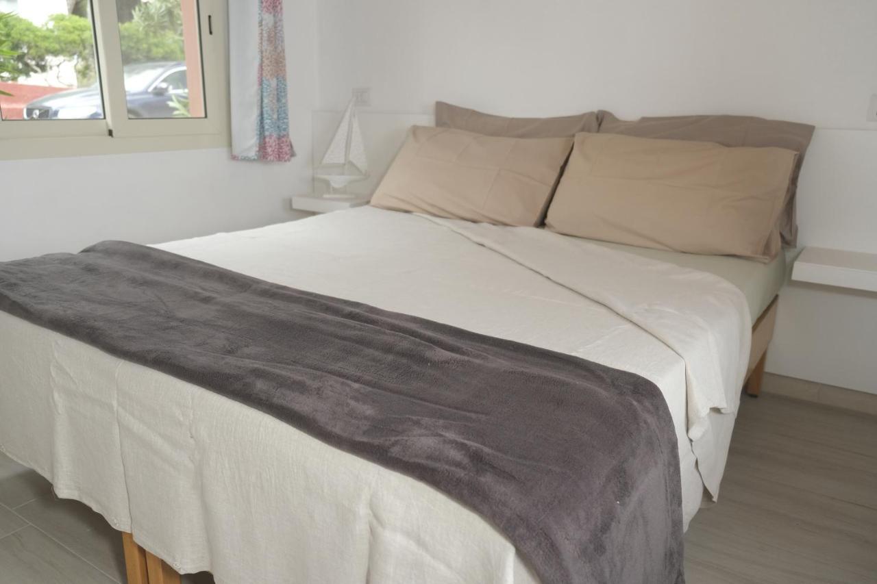 Villaggio Camping Torre Del Porticciolo ปอร์โต คอนเต ห้อง รูปภาพ