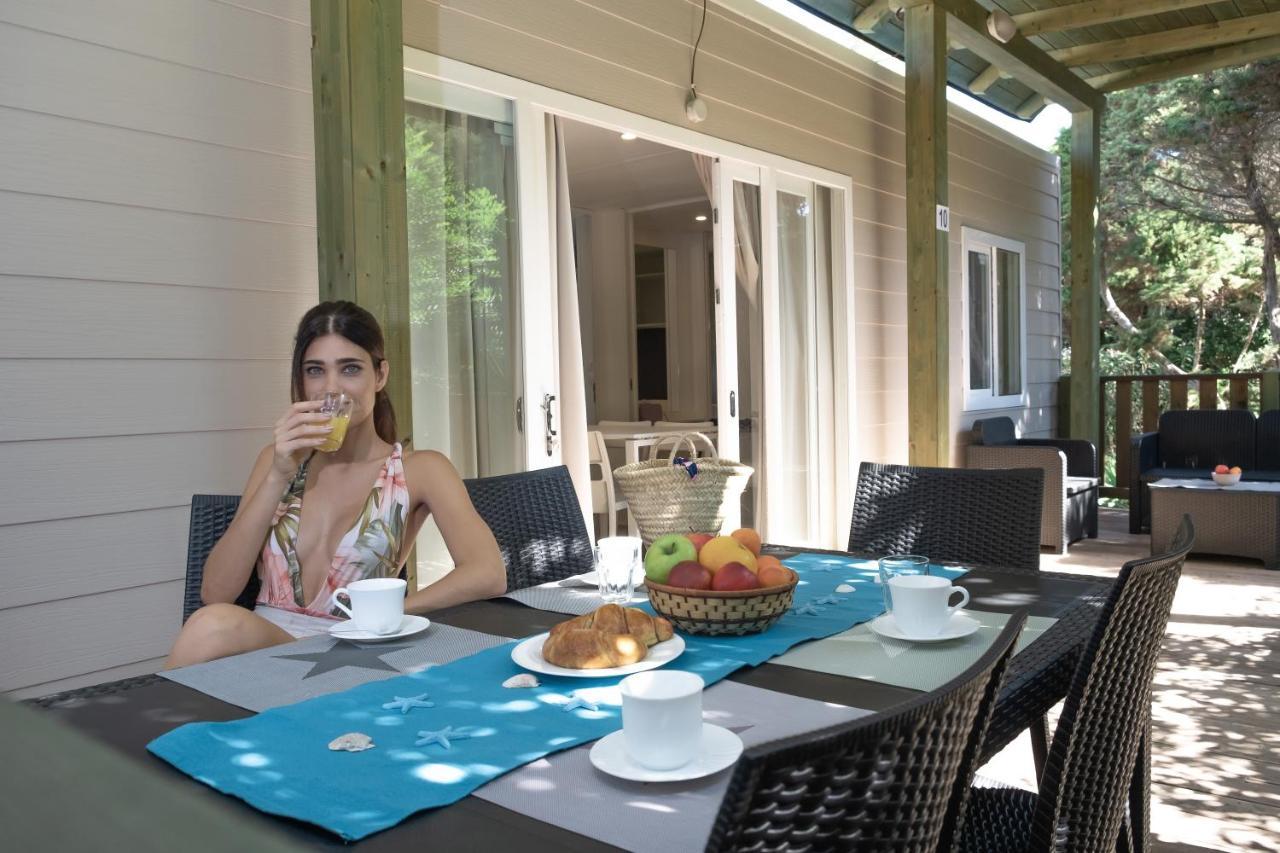 Villaggio Camping Torre Del Porticciolo ปอร์โต คอนเต ภายนอก รูปภาพ