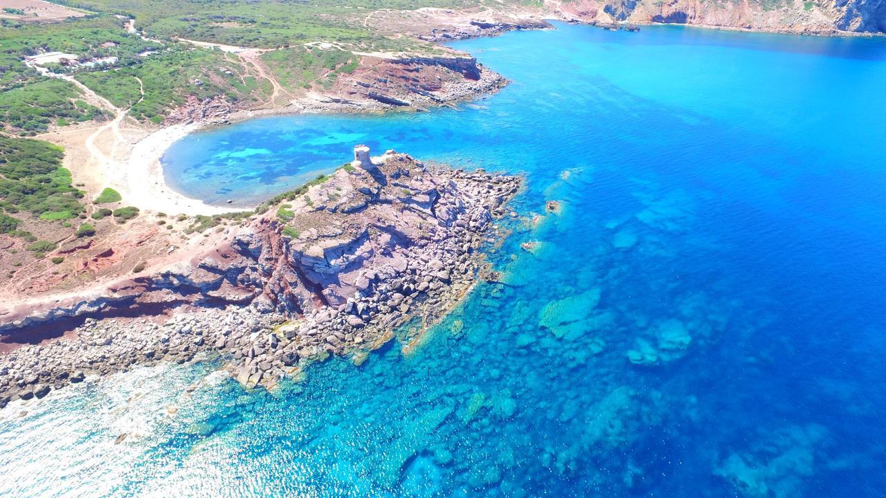 Villaggio Camping Torre Del Porticciolo ปอร์โต คอนเต ภายนอก รูปภาพ