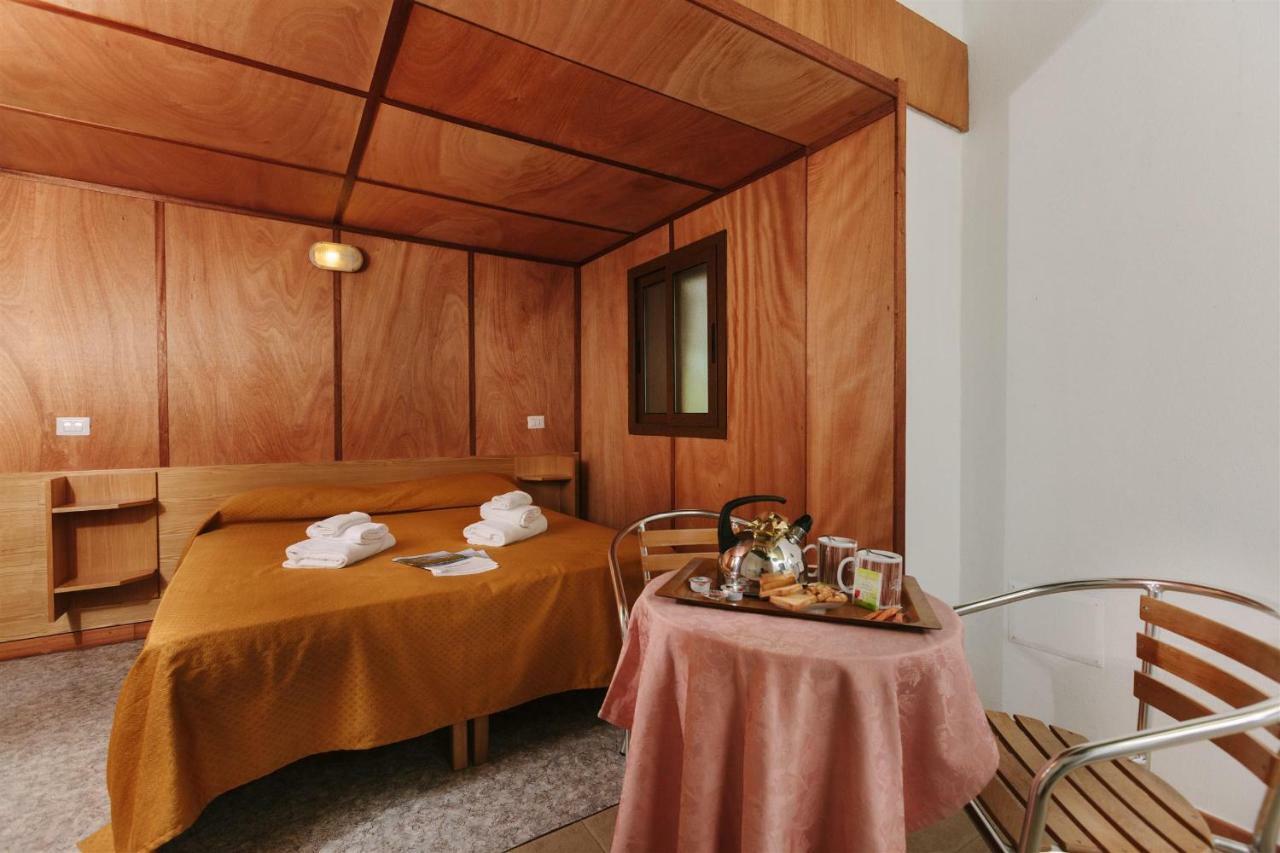 Villaggio Camping Torre Del Porticciolo ปอร์โต คอนเต ห้อง รูปภาพ
